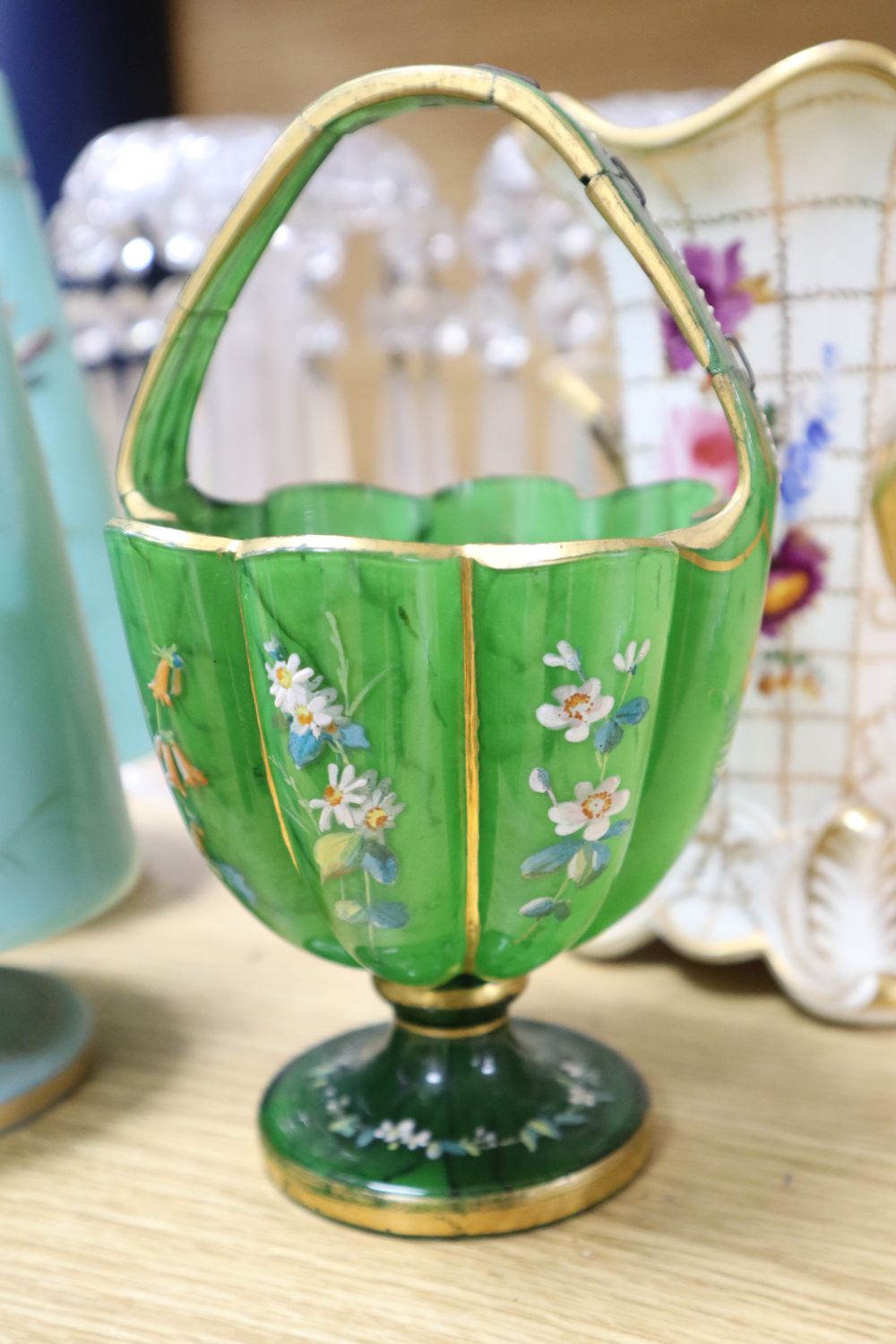 A pair of Victorian cut glass lustres, a pair of lidded glass jars, a basket and a porcelain vase